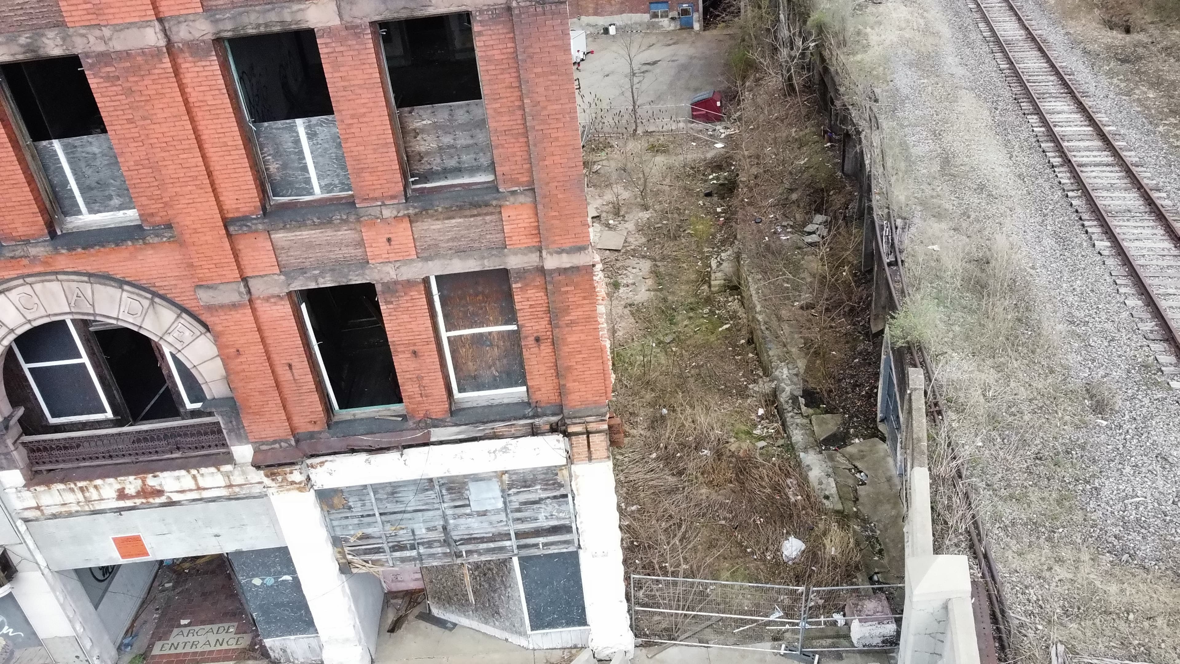Detailed aerial image of the Arcade Building and nearby downtown properties.