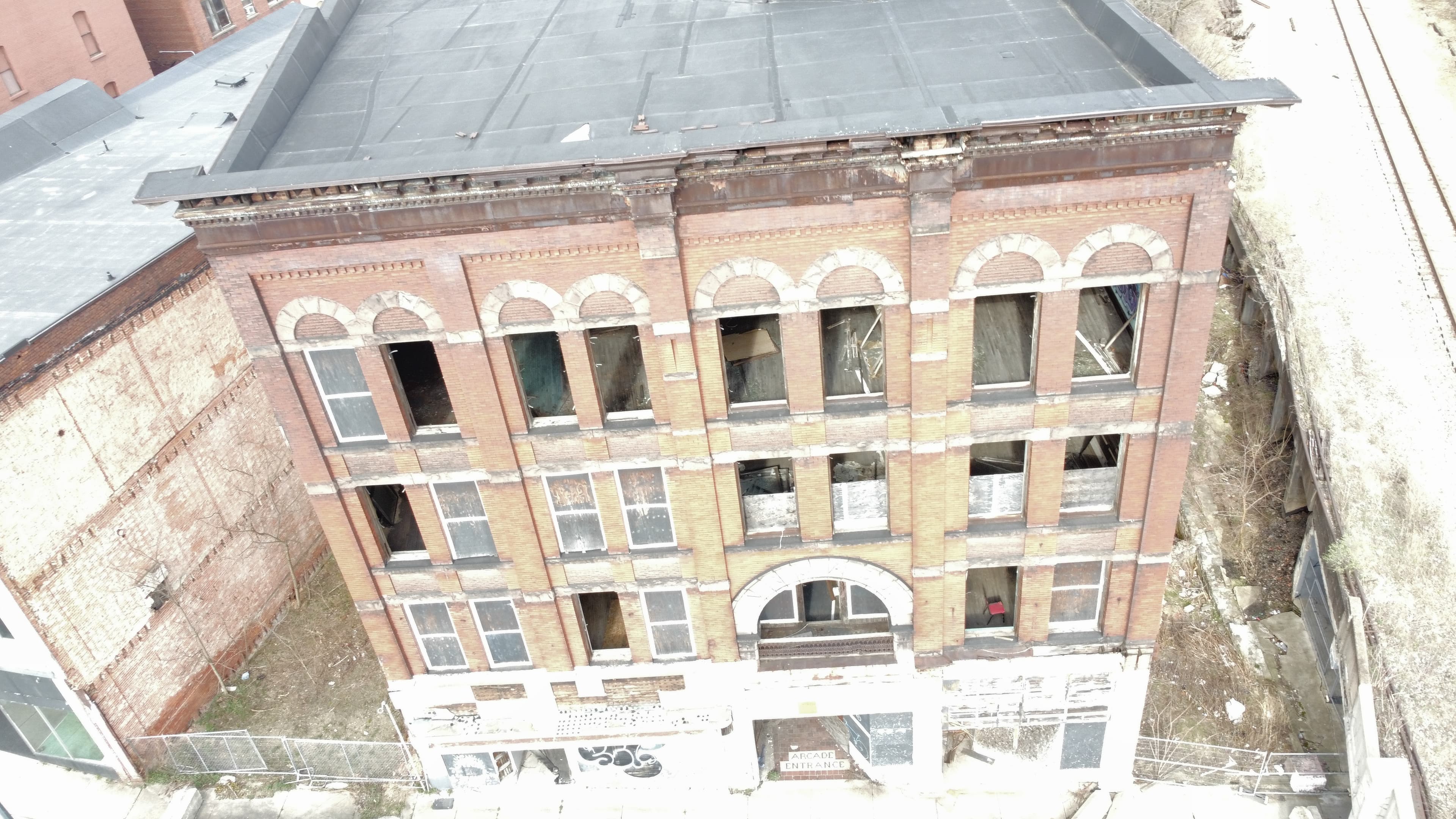 Elevated view showing side and roofline detail of the Arcade Building.